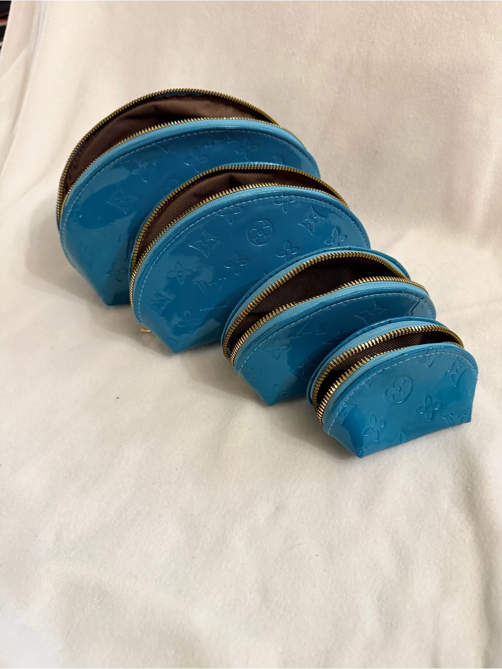 Designer-Inspired Blue Patent pleather Dome Pouches - Set of 4